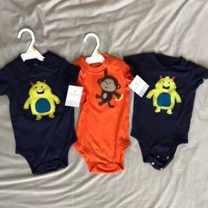 Carter’s boy onesie lot. Two NWT